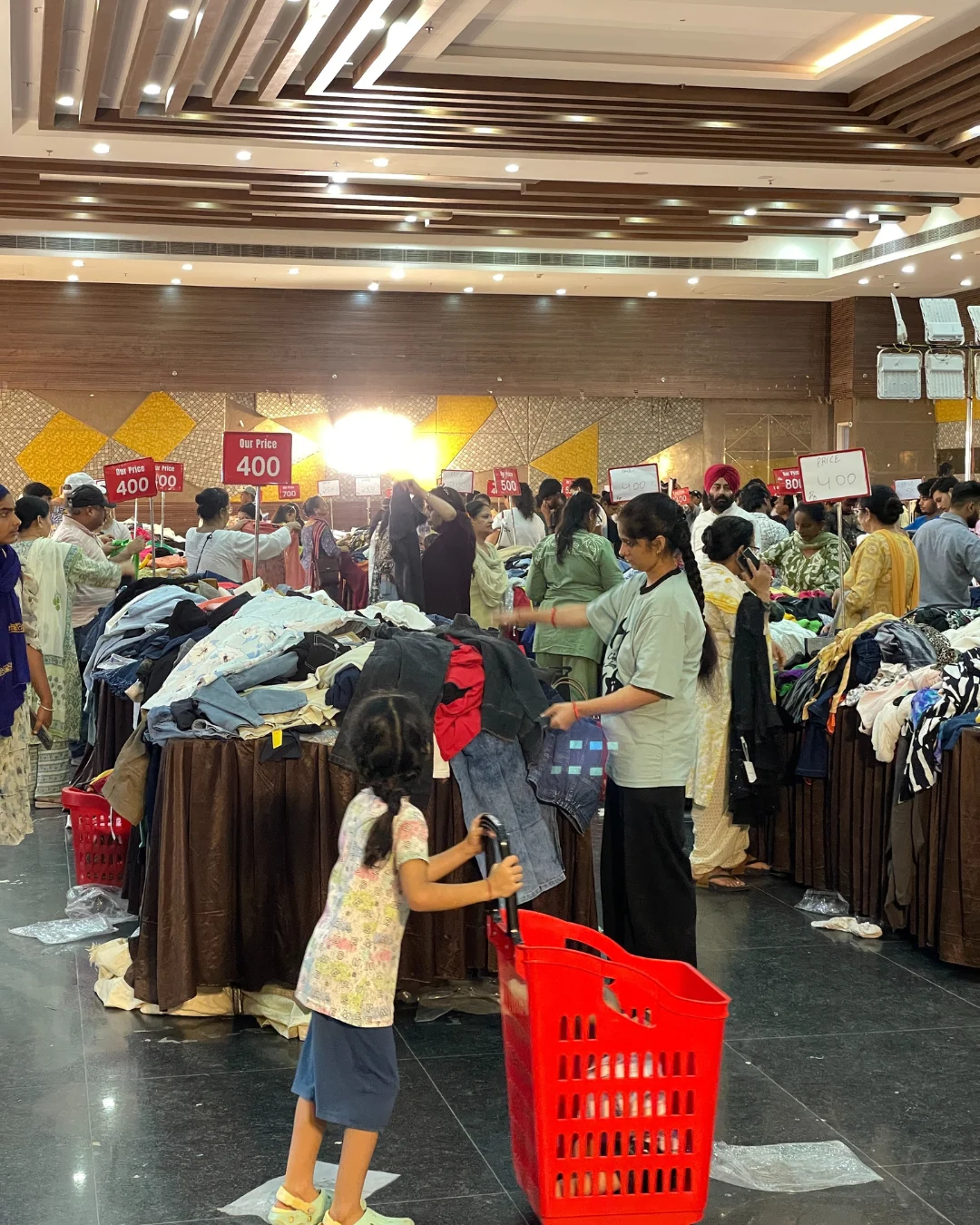 People shopping for discounted fashion items